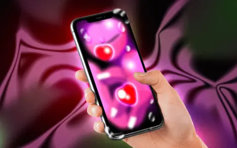 Mano che tiene uno smartphone con icone a forma di cuore, forse per un'app di f.dating. Sfondo sfumato viola e verde.