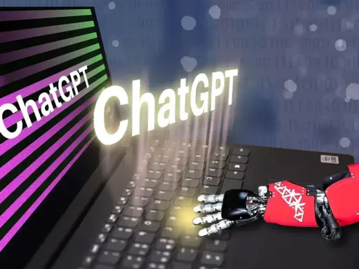 Un braccio robotico interagisce con un laptop, mostrando il logo ChatGPT. Un'immagine che evoca il futuro del chat random Italia.