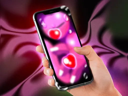 Mano che tiene uno smartphone con icone a forma di cuore, forse per un'app di f.dating. Sfondo sfumato viola e verde.