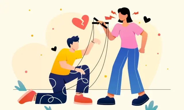 Una donna con la mania del controllo muove un uomo come un burattino, con un cuore spezzato sullo sfondo.