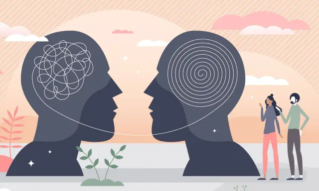 Due profili stilizzati si fronteggiano, uno con pensieri aggrovigliati, l'altro con una spirale. Una coppia osserva, simboleggiando l'attrazione mentale.