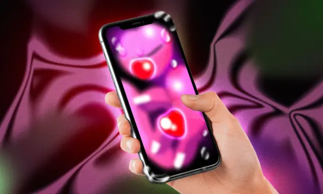 Mano che tiene uno smartphone con icone a forma di cuore, forse per un'app di f.dating. Sfondo sfumato viola e verde.