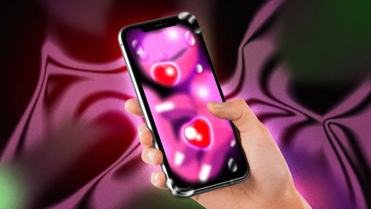 Mano che tiene uno smartphone con un'app di incontri, con cuori rossi luminosi e un'interfaccia vibrante. La nirvam registrazione &egrave; in corso, catturando l'essenza di una connessione digitale.