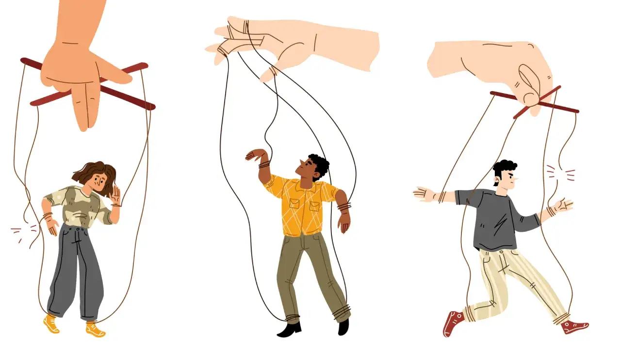 Mani controllano marionette umane, un'immagine che illustra il gaslighting significato: manipolazione psicologica per far dubitare qualcuno della propria sanità mentale.